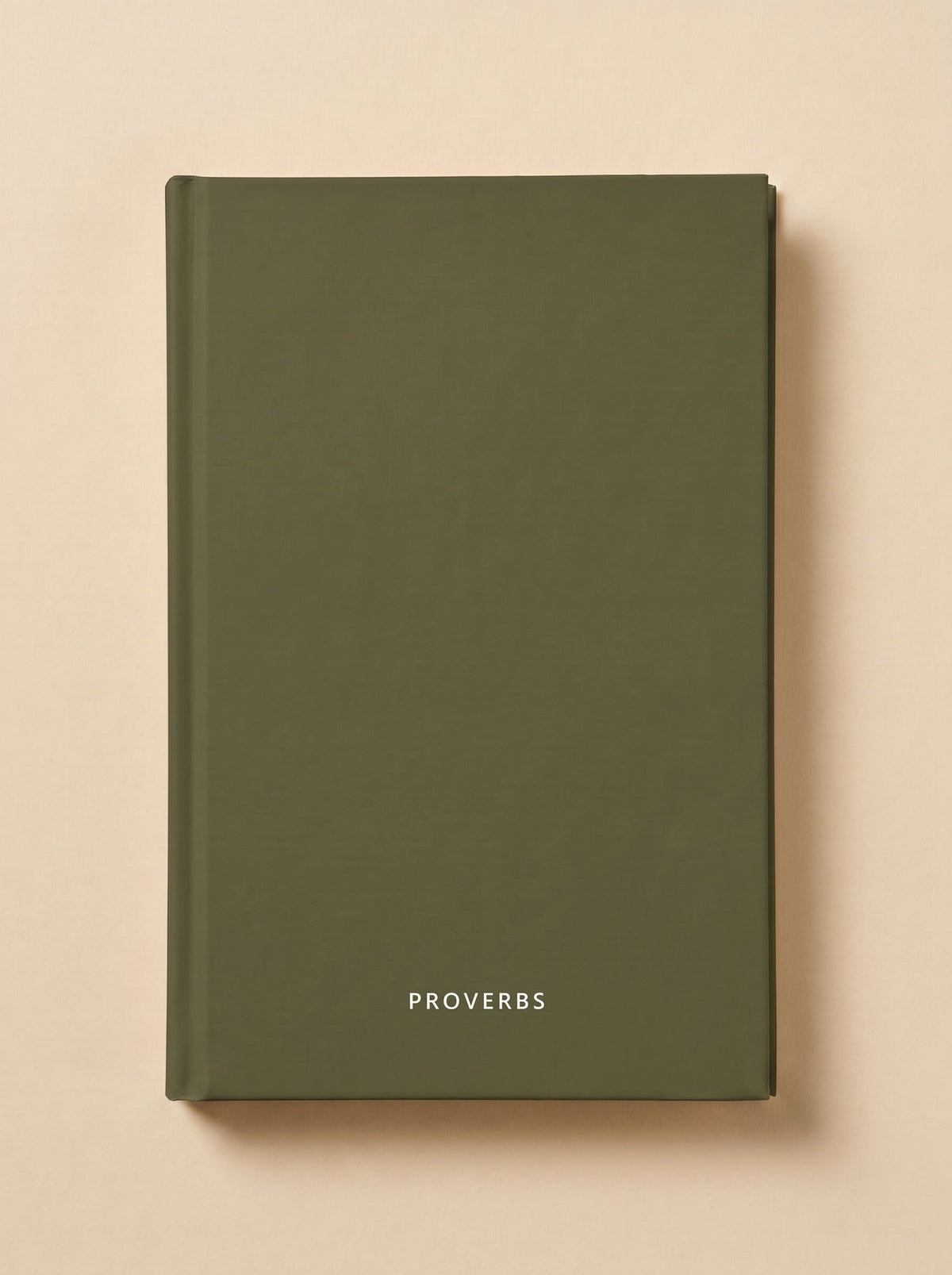 Proverbs hardcover in olive, seen from above
